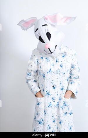 rabbit difficult to wake in the morning dressing-up clothes and conceptual parody Stock Photo