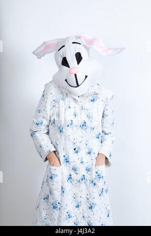 rabbit difficult to wake in the morning dressing-up clothes and conceptual parody Stock Photo