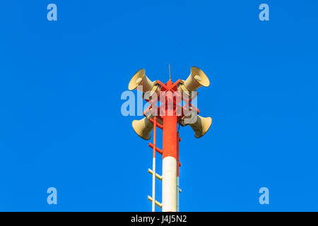 Tsunami siren warning loudspeakers are installed on the beach in Thailand Stock Photo