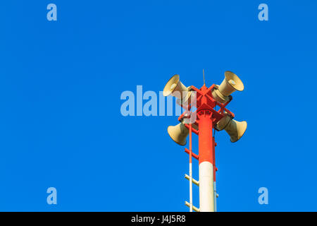 Tsunami siren warning loudspeakers are installed on the beach in Thailand Stock Photo