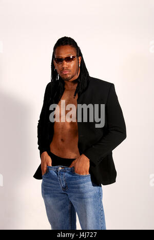 Young black man with braids in a studio Stock Photo