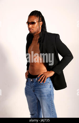 Young black man with braids in a studio Stock Photo