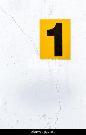 the number 1 on a old wall. Texture, Backgrounds Stock Photo