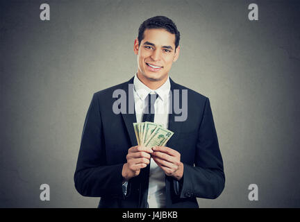 successful business man with money smiling Stock Photo