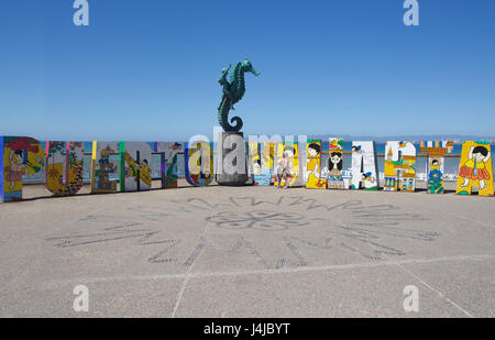 February 21, 2017: Puerto Vallarta art sculpture on the Malecon boardwalk. Rafael Zamarripa's 'The Boy on the Seahorse' (Little Seahorse) statue on th Stock Photo