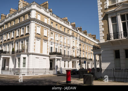 Facade of opulent British Victorian Edwardian terraced flat in red ...