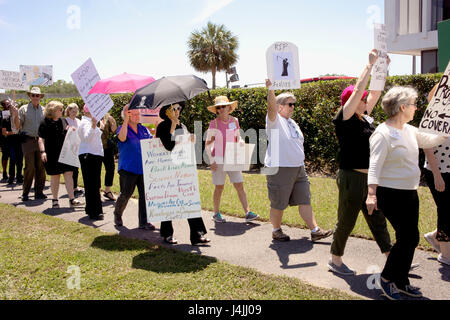 Health care revison protesters demonstrate outside Louisiana Rep's office building in New Orleans, LA, USA.  May 8, 2017. Stock Photo