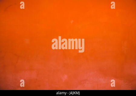 Oriental orange-red plastered wall Stock Photo