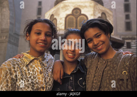 Egypt, Nile delta, Cairo, girl, arm in arm, happily, portrait no model release outside, Africa, East, town, capital, city, Egyptians, friends, three, friendly, smile Stock Photo
