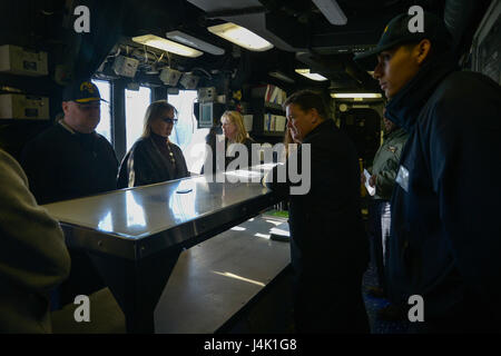 NEW YORK (Nov. 12, 2016) – Capt. James R. Midkiff, commanding officer, amphibious assault ship USS Iwo Jima (LHD 7) leads a tour of the ship. Iwo Jima is participating in Veterans Week New York City 2016 to honor the service of all our nation’s veterans. The ship recently returned from the humanitarian assistance mission to Haiti in the aftermath of Hurricane Matthew #USNavy #NYC #VeteransDay #Neverforget (U.S. Navy photo by Petty Officer 2nd Class Andrew Murray/Released) Stock Photo