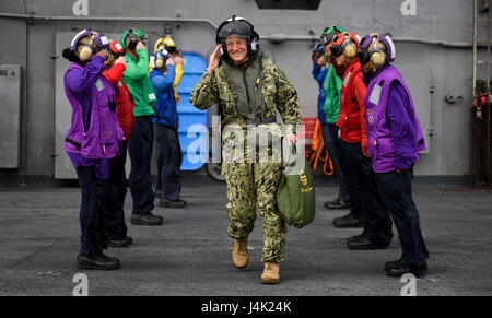170105-N-BL637-244  PACIFIC OCEAN (Jan. 5, 2017) Sideboys from the aircraft carrier USS Carl Vinson (CVN 70) render honors to Vice Adm. Nora Tyson, commander, U.S. 3rd Fleet. Tyson flew aboard the carrier to thank the deploying Sailors for their dedication to the mission prior to the ship pulling away from its homeport of San Diego. The Carl Vinson Carrier Strike Group will report to U.S. 3rd Fleet, headquartered in San Diego, while deployed to the western Pacific as part of the U.S. Pacific Fleet-led initiative to extend the command and control functions of 3rd Fleet into the region.  (U.S. N Stock Photo