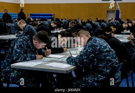 170316-N-OI810-023 YOKOSUKA, Japan (March 16, 2017)  Sailors assigned to the Navy's only forward-deployed aircraft carrier, USS Ronald Reagan (CVN 76), take the petty officer third class advancement exam at James D. Kelly Fleet Recreation Center. Twenty-one proctors oversaw more than 540 test-takers. Ronald Reagan, the flagship of Carrier Strike Group 5, provides a combat-ready force that protects and defends the collective maritime interests of its allies and partners in the Indo-Asia-Pacific region. (U.S. Navy photo by Mass Communication Specialist 2nd Class (SW/AW) Nathan Burke/Released) Stock Photo