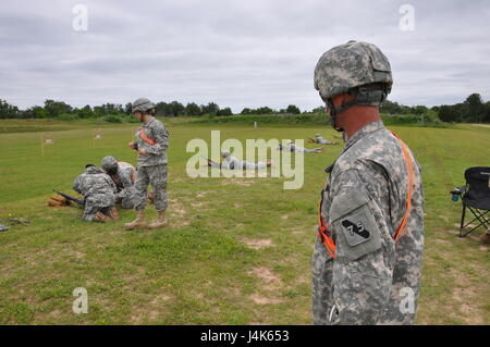 In this image released by the Army Reserve's 75th Training Command, Soldiers with the unit's Headquarters Detachment train at a military rifle range in Bastrop, Texas, Saturday, April 22, 2017. High individual readiness in the reserves in areas like marksmanship helps deter threats abroad. (Photo/75th Training Command, Army Reserve Lt. Col. Adam Collett) Stock Photo