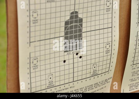 In this image released by the Army Reserve's 75th Training Command, Soldiers with the unit's Headquarters Detachment train at a military rifle range in Bastrop, Texas, Saturday, April 22, 2017. High individual readiness in the reserves in areas like marksmanship helps deter threats abroad. (Photo/75th Training Command, Army Reserve Lt. Col. Adam Collett) Stock Photo