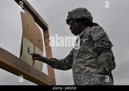 In this image released by the Army Reserve's 75th Training Command, Soldiers with the unit's Headquarters Detachment train at a military rifle range in Bastrop, Texas, Saturday, April 22, 2017. High individual readiness in the reserves in areas like marksmanship helps deter threats abroad. (Photo/75th Training Command, Army Reserve Lt. Col. Adam Collett) Stock Photo