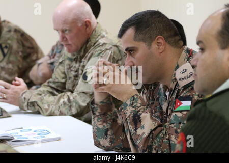 Col. Brent Johnson (left), Staff Judge Advocate for the 29th Infantry Division and Task Force Spartan, participates in a symposium on operational law and military justice with military judges from the Jordan Armed Forces- Arab Army April 25, 2017, near Amman, Jordan. The four-day symposium included U.S. Army and U.S. Air Force legal professionals from the U.S. Central Command and military judges from the Jordan Armed Forces- Arab Army. (U.S. Army National Guard photo by Master Sgt. A.J. Coyne) Stock Photo
