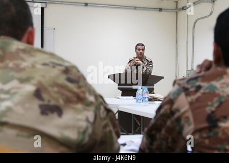 A military judge from the Jordan Armed Forces- Arab Army leads a discussion on operational law and military justice during a U.S.-Jordanian military legal symposium April 27, 2017, near Amman, Jordan. The four-day symposium included U.S. Army and U.S. Air Force legal professionals from the U.S. Central Command and military judges from the Jordan Armed Forces- Arab Army. (U.S. Army National Guard photo by Master Sgt. A.J. Coyne) Stock Photo