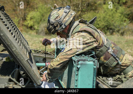 Reconnaissance Operations Army A British soldier conducts pre-combat checks on an FV107 Scimitar ...