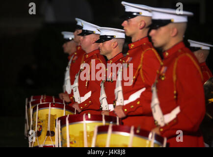 Marines with “The Commandant’s Own” the U.S. Marine Drum and Bugle Corps, perform “music in motion” during a Friday Evening Parade at Marine Barracks Washington D.C., May 5, 2017. The guests of honor for the parade were the Honorable Paul Cook, California’s 8th Congressional District Congressman, the Honorable Jack Bergman, Michigan’s 1st Congressional District Congressman, and the Honorable Salud Carbajal, California’s 24th Congressional District Congressman. The hosting official was Gen. Glenn Walters, assistant commandant of the Marine Corps.(Official Marine Corps photo by Lance Cpl. Damon  Stock Photo
