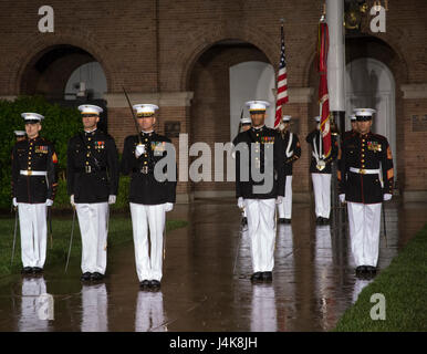 The Parade Staff performs during a Friday Evening Parade at Marine Barracks Washington D.C., May 5, 2017. The guests of honor for the parade were the Honorable Paul Cook, California’s 8th Congressional District Congressman, the Honorable Jack Bergman, Michigan’s 1st Congressional District Congressman, and the Honorable Salud Carbajal, California’s 24th Congressional District Congressman. The hosting official was Gen. Glenn Walters, assistant commandant of the Marine Corps. (Official Marine Corps photo by Cpl. Robert Knapp/Released) Stock Photo