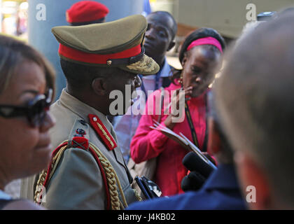 Gen. Griffin “Spoon” Phiri, Malawi Defence Force chief of staff speaks to media during a press huddle after the African Land Forces Summit 2017 opening ceremony, in Lilongwe, Malawi, May 8, 2017. ALFS is an annual, weeklong seminar bringing together land force chiefs from across Africa for candid dialog to discuss and develop cooperative solutions to regional and transregional challenges and threats. (U.S. Army photo by Sgt. Paige Behringer) Stock Photo