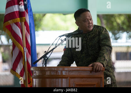 Philippine Army Col. Laurence Mina delivers his remarks during the opening ceremony of Balikatan 2017 at Fort Magsaysay in Santa Rosa, Nueva Ecija, May 8, 2017. Balikatan is an annual U.S.-Philippine bilateral military exercise focused on a variety of missions including humanitarian and disaster relief, counterterrorism, and other combined military operations. (U.S. Marine Corps photo by Lance Cpl. Matthew Casbarro) Stock Photo