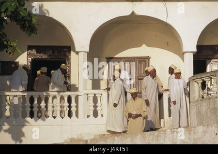 The Comoro Archipelago, island Grand Comore, Moroni, mosque, exit, believers no model release! Africa, island state, Njazidja, church, sacred construction, faith, religion, prayer house, Islam, Muslims, men, non-whites, swarthy, swarthy, clothes, headgear, traditionally, uniformly Stock Photo