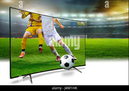 4k monitor watching smart tv translation of football game. Concept Stock Photo