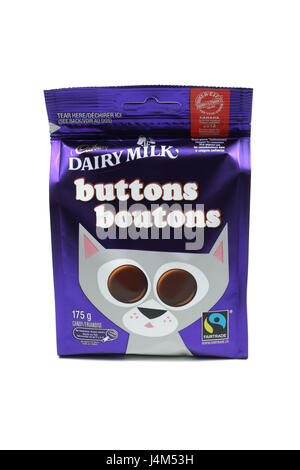 Cadbury Buttons disc shape chocolates in English and French packaging for the Canadian market. Stock Photo