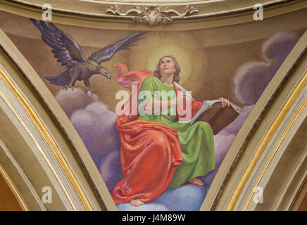 TURIN, ITALY - MARCH 13, 2017: The fresco of St. John the Evangelist in cupola of Church Chiesa di Santo Tommaso by C. Secchi from bechin of 20. cent. Stock Photo