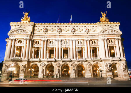 The magnificent Palais Garnier at dusk in Paris, France. The Palais is a 1,979-seat Opera House built for the Paris Opera. Stock Photo