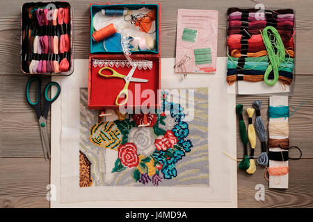 Embroidery supplies on table Stock Photo