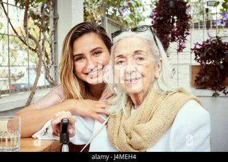Portrait of smiling grandmother and granddaughter Stock Photo