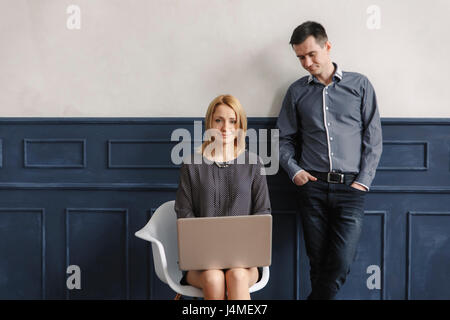 Middle Eastern couple using laptop Stock Photo
