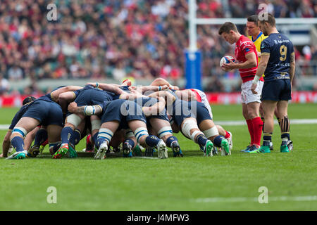 A rugby scrum is ready for the scrum half to put the ball in Stock Photo