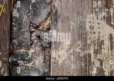 Close-up rough wood texture with sand from beach boardwalk Stock Photo