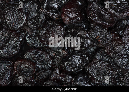 Top view of prunes as background texture Stock Photo