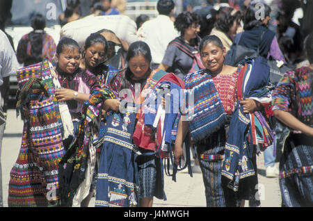 Guatemala, Sacatepequez, Antigua Guatemala, women, young, textiles, sell, no model release! Central America, Central America, Latin America, town, economy, sales, shop assistants, cheerfulness, handicraft, carpets, substances, offer, trade, street sales, outside Stock Photo