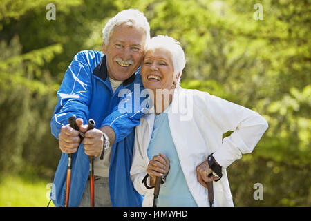 Forest way, senior citizen's couple, Nordic Walking, breather, half portrait senior citizens, couple, outside, leisure time, hobby, run technology, rest, equaliser, bold burn, sport, sportily, fun, sport activity, actively, fitness, fit, perseverance, perseverance sport, Vital, vitality, motion, leisure time sport, nature, telescope floors, floors, trend sport, training, happily, smile, break, Best of all Age,