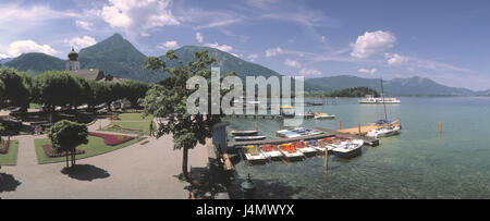 Austria, salt chamber property, Wolfgang's lake, Strobl, promenade, landing stage, boots Europe, Upper Austria, Saint Wolfgang's lake, the Abersee, tourism, tourist resort, bridges, to wooden jetty, landing stages, pedal boats, bank promenade, park, park, church, steeple, mountains, mountain range Stock Photo