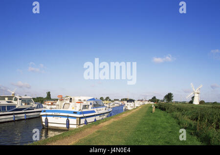 Great Britain, Norfolk, River Thurne, boats, riversides, windmill, England, river scenery, scenery, mill, structure, place of interest, river, waters, boats, anchor, invest, destination, tourism, Stock Photo