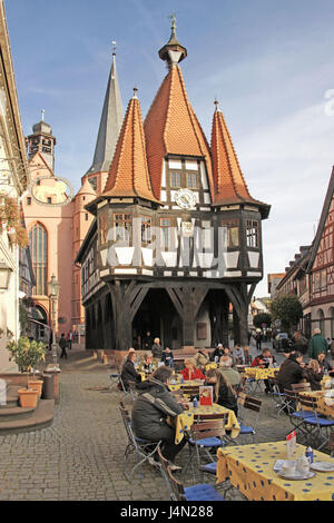 Germany, Hessen, Michel's town, Old Town, historical city hall, street cafe, tourist, ode wood, town, marketplace, building, half-timbered city hall, city hall, structure, architectural style, late Gothic, place of interest, street bar, person, guests, tourism, Stock Photo