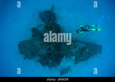 Diver, aircraft wreck, Stock Photo