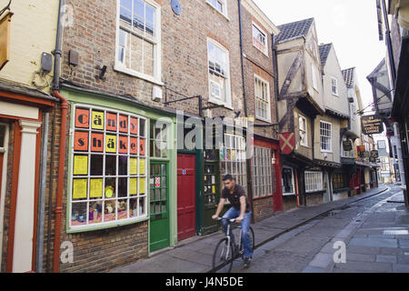 Great Britain, England, Yorkshire, York, Shambles, shopping street, shops, cyclists, Stock Photo