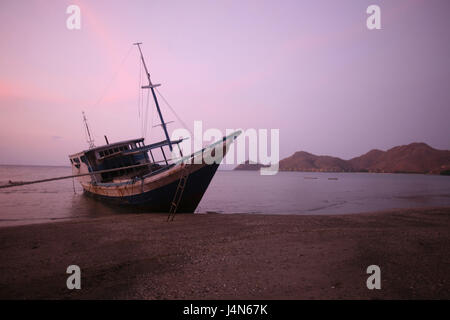 Democratic republic of Timor-Leste, Dili, cape Fatucama, beach, fishing trawler, evening light, Stock Photo