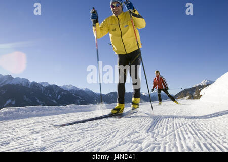 Austria, Tyrol, Fiss, couple, cross-country, cross-country trail, winter scenery, panorama Stock Photo