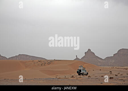 North Africa, Morocco, Sahara, desert, rock, mountains, sport utility vehicles, camping, Stock Photo