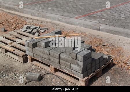 Concrete pavement. Construction of a new street. Roadwork Stock Photo