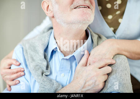 Senior spouses holding by hands Stock Photo