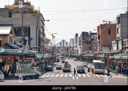 Kyoto, Japan - March 2016: Seen from Yasaka Shrine, Shijo Street running center of Kyoto, Japan east to west through the commercial center of the city Stock Photo